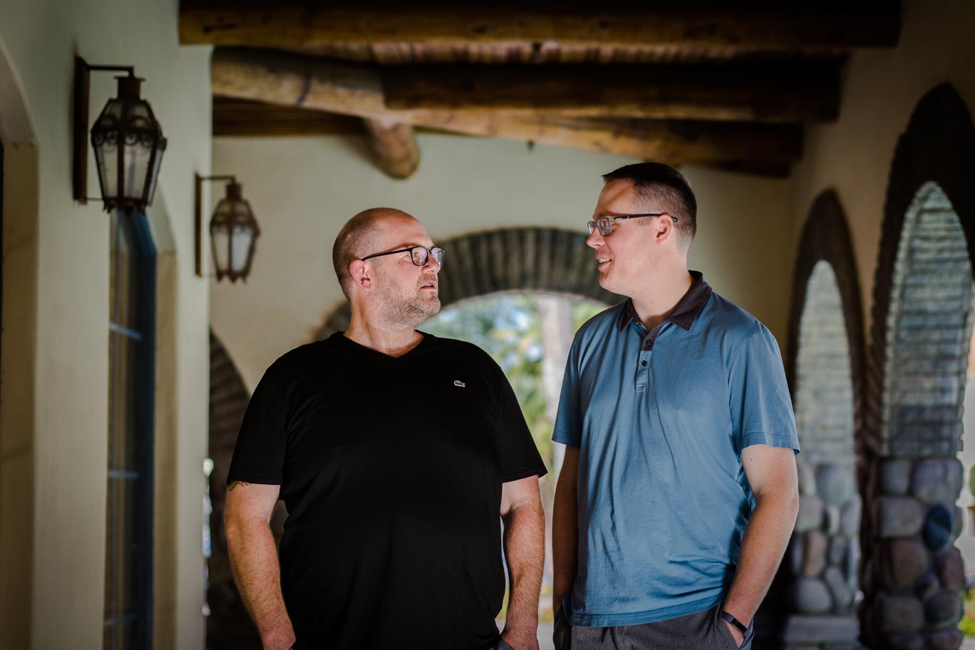 kevin-and-fred-looking-at-each-other-for-serious-pose-during-brand-photography-session-in-tempe-az-by-prefocus-solutions