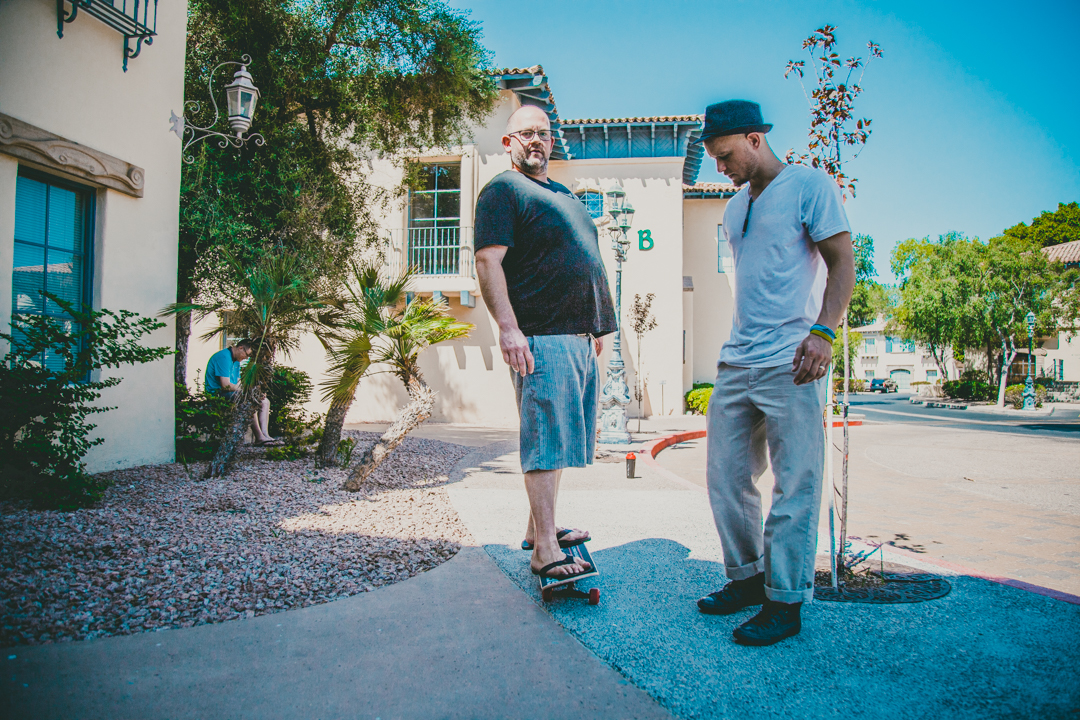 jordan trask with kevin kaughman in tempe az at real estate agents headquarters during photoshoot with prefocus