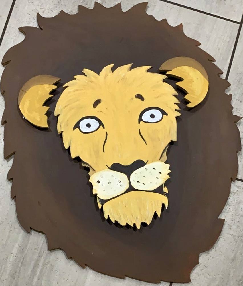 creative artwork painting of lion's face with mane staring for childrens bedroom decoration custom woodwork near memphis