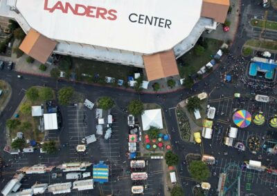clear landers center branding atop aerial birds eye view by prefocus solutions during midsouth fair 2022 with rides games and food desoto county event services
