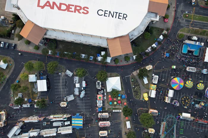 clear landers center branding atop aerial birds eye view by prefocus solutions during midsouth fair 2022 with rides games and food desoto county event services