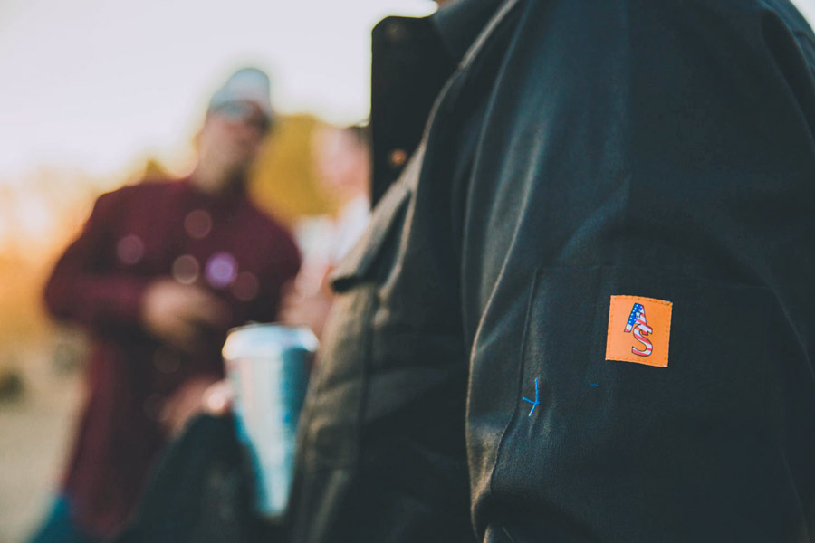 original image of blue collar work wear on welding professional on midwouth farm captured by danielle from prefocus photography near memphis shoulder for pen with logo sticked quality material