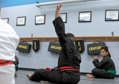 teen training for discipline near memphis martial arts videography by prefocus solutions creative director jordan trask on mat attentive listening